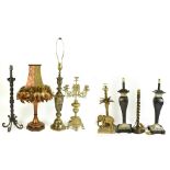 Eight decorative table lamps including a brass example modelled as an elephant beside a palm tree,