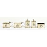 WILLIAM HAIR HASELER; a George V hallmarked silver five piece cruet, each applied with central