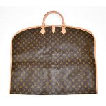 LOUIS VUITTON; a monogram canvas garment/suit carrier with one hanger, made from monogram fabric and