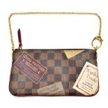 LOUIS VUITTON; a limited edition 'Damier Ebony canvas Milla MM Pochette' with red suede interior and