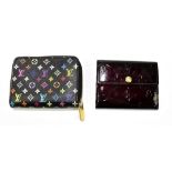 LOUIS VUITTON; a multicolour monogram zippy coin purse wallet with fuchsia pink interior and a zip