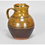 MICHAEL CARDEW (1901-1983) for Winchcombe Pottery; a slipware jug with simple abstract sgraffito