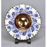 GORDON FORSYTH (1879-1952); a white earthenware charger, copper lustre on cobalt underglaze, painted