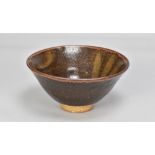 WILLIAM STAITE MURRAY (1881-1962); a deep stoneware bowl decorated with a bird, impressed mark and