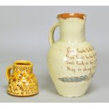 EDWIN BEER FISHLEY (1832-1912) for Fremington Pottery; a large slipware jug covered in pale yellow