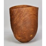 ANTHONY BRYANT (born 1960); a turned oak thin walled vessel with wavy rim, incised signature and