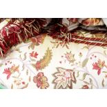 A quantity of quilted and lined curtains with floral decoration on beige background,