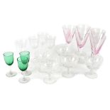 A quantity of cut glass and other drinking glasses to include wine glasses, Champagne glasses, etc.