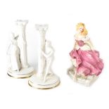 A Franklin Mint figure 'Cinderella' and a pair of Franklin Mint Parian ware Romeo & Juliet