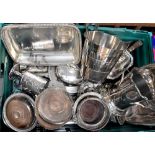 A quantity of silver plated ware to include ice buckets, wine coasters with turned wooden bases,