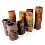 Eight Japanese bamboo brush pots, each traditionally carved, height of largest 35cm (8).