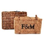 A Fortnum & Mason wicker picnic hamper and one other larger picnic hamper (2).