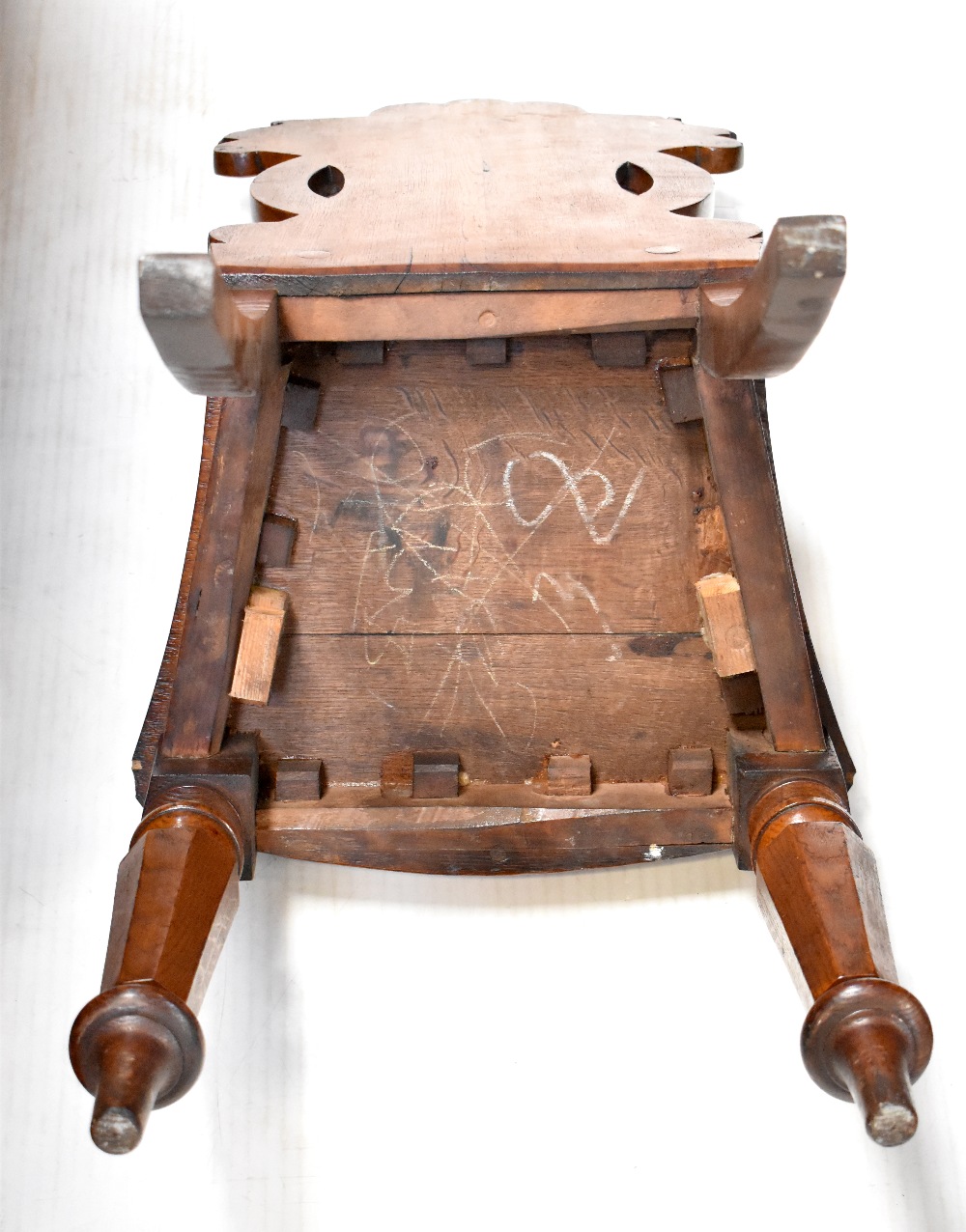 A pair of 19th century oak hall chairs, the backs with carved circular motifs, - Image 4 of 4