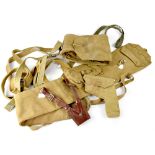 Two canvas rifle bags, one marked for 1942 with side pockets, a canvas pistol holster,