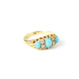An 18ct gold ring set with three oval cabochon turquoises alternating with two pairs of old cut