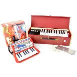 A boxed Bontempi Cico child's Steel-Reed accordion and a Lorenzo portable organ in original box (2).