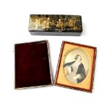 A Victorian watercolour, three-quarter length miniature portrait of a seated lady, in an oval frame,