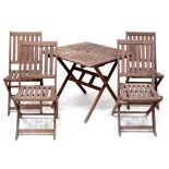 A hardwood garden table and four matching slat foldable chairs (5).