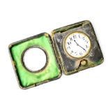 An eight-day travelling clock, the enamelled dial set with Arabic numerals,