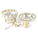 Various items of silver to include a sterling silver tea strainer, a sterling silver dish,