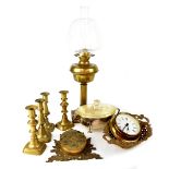 Various items of brassware to include a paraffin lamp with rippled clear glass shade,