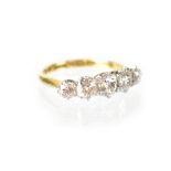 A late 19th/early 20th century 18ct gold and platinum mounted diamond ring set with five graduated