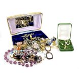 A quantity of vintage and contemporary jewellery to include amethyst coloured and crystal glass