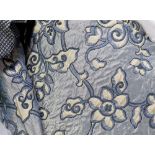 A quantity of curtains, silk satin-effect brocade, dark blue ground with cream floral decoration,