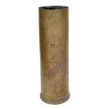 A large brass 1960 6in Mk N5 gun brass artillery shell case (lot 84), length 58.5cm.