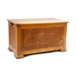 A modern oak blanket box with fielded panels, on block feet, height 55cm, width 96cm, depth 51cm.