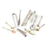 Various silver items comprising sugar tongs, glove hook, pickle fork, fruit knife, dessert spoon,