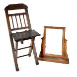 A small c1940s oak children's fold-up picnic chair and a rectangular dressing table swing mirror