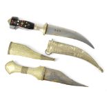 Two Middle Eastern ornamental daggers with plated sheaths, length of the longest 25cm (2).