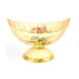 Royal Worcester; a floral hand painted blush shell vase on circular fluted base,