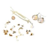 Seven pairs of earrings including gold,
