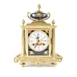 A modern Franz Hermle & Sons brass and enamelled eight-day mantel clock in the French style,