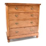 A Victorian mahogany chest of two short over three long graduated drawers with brass swan neck drop