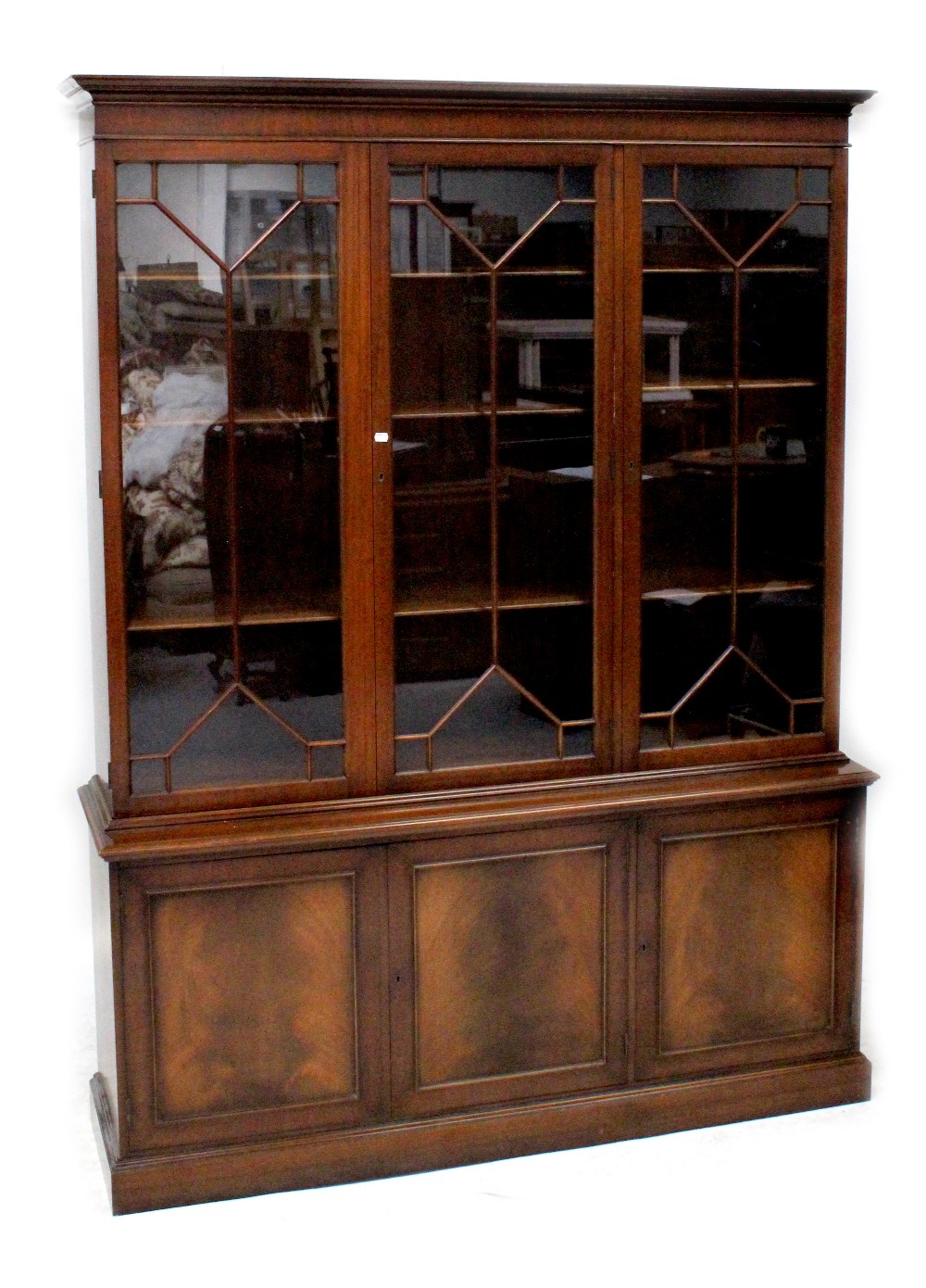 A reproduction mahogany bookcase,