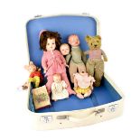 A Pelham puppet of 'Rupert Bear', four plastic and composite jointed dolls,