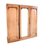 A Victorian mahogany matching linen press and single wardrobe, possibly converted from a triple,