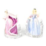 A pair of Franklin Mint figures on glass bases, 'Princess of the Ice Palace' and 'The Snow Queen',