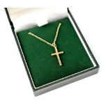 A 9ct gold necklace with gold cross pendant set with tiny diamond to centre, length approx 50cm,