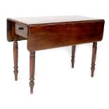 A 19th century mahogany Pembroke table with small drawer to the side,