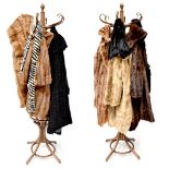 Various fur coats, fur collars and stoles.