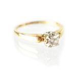A 14k gold diamond solitaire ring, the prong set diamond approx 0.