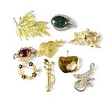 Nine various gem set brooches (9).