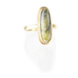 A 9ct gold ring set with cabochon green hardstone, stamped 375, size N1/2, approx 4.2g.