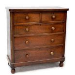 A Victorian mahogany two-over-three chest of drawers to large ball supports, 128 x 120cm.