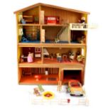 A Lundby mid-20th century stackable plastic dolls' house in three tiers,