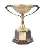 A George VI hallmarked silver twin-handled trophy of Art Deco form, blank,